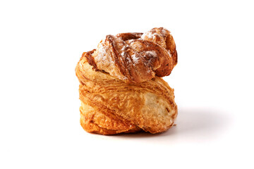 Golden flaky pastry cuffin with cinnamon twist and sugar topping