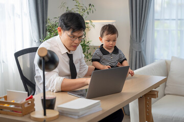 Asian baby and families who have to work while raising children at home