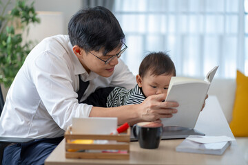 Asian baby and families who have to work while raising children at home