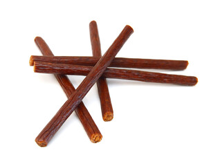 Smoked thin sausages, isolated on white