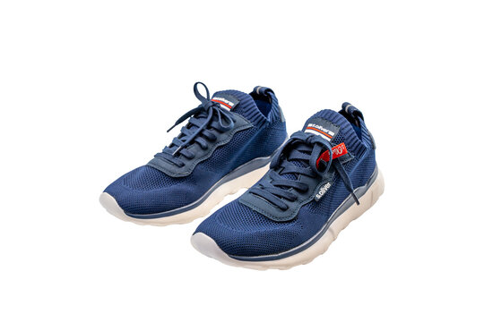 Germany Berlin December 2, 2024. Blue sneakers from Oliver on a white background.