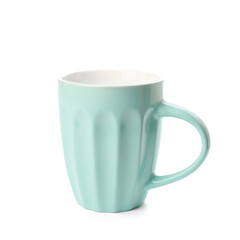 Blue ceramic cup on white background