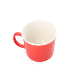 Red ceramic cup on white background