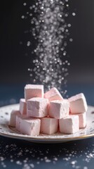 Delicious Pink Marshmallows sprinkled with Sugar on Plate