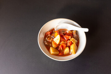 Christmas eve stew on black background