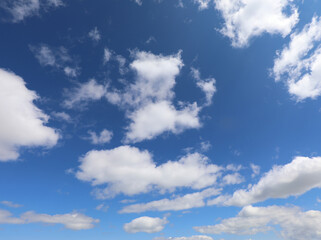 background of blue sky and white clouds ideal as a concept of pure breathable and natural air