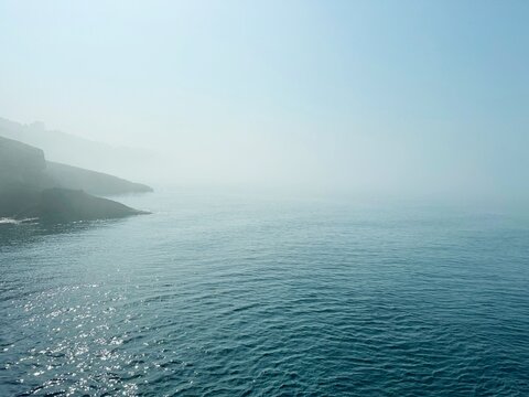 Fog over sea and coast at early morning.