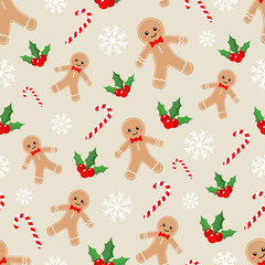 Vector pattern with Christmas gingerbread men, candy canes and a Christmas plant
