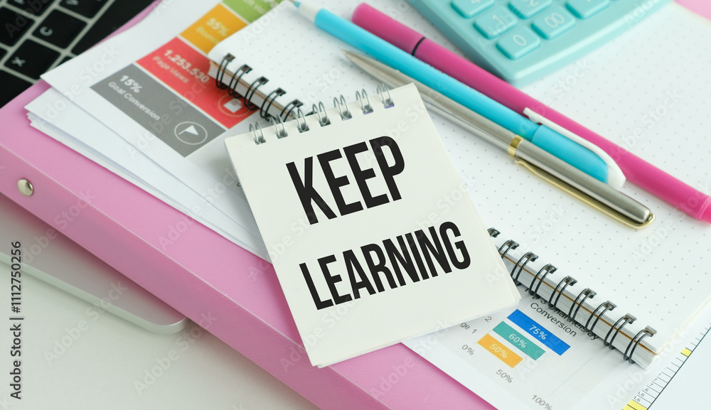 Poster keep learning text written on notebook paper with calculator on chart background