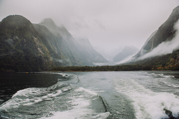 Image of Milford Sound-  a fiord in the south west of New Zealand's South Island within Fiordland National Park, Milford Sound is a fiord in th(Milford Sound) Marine Reserve, on a misty winter morning