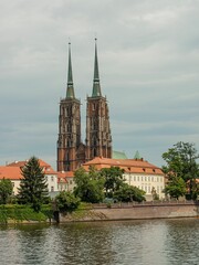 Naklejka premium Scenic view of Wroclaw Cathedral from the other side of the river in Wroclaw, Poland