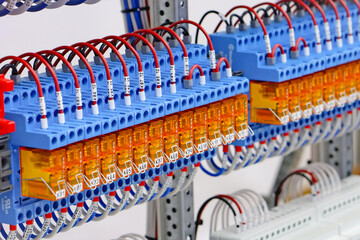 Electromagnetic relays for control in automation circuits. Close-up. Soft focus.