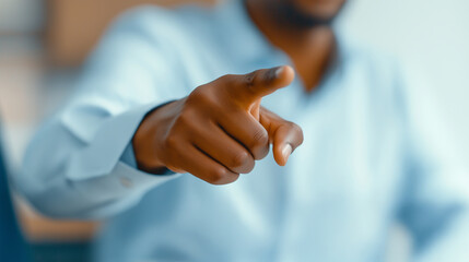 Businessman pointing finger accusing and showing direction