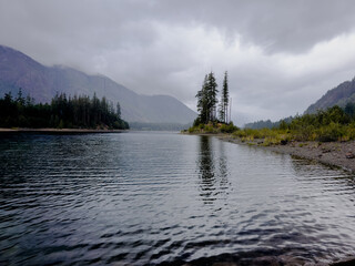 Dramatic view of Upper Campbell Lake during a storm during peak tourist season.
