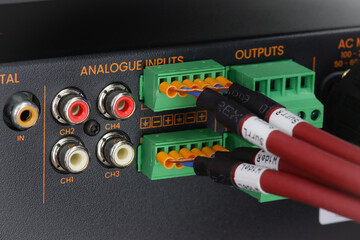 Connecting multimedia equipment in a telecommunications rack.