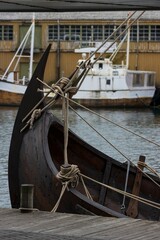 Close-up of a mooring viking merchant ship with clinker buildtbow.