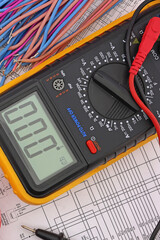A digital multimeter for measuring the parameters of electrical circuits. Close-up. Soft focus.