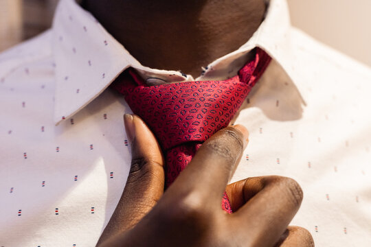 Advanced tie knot techniques and bow tie styling