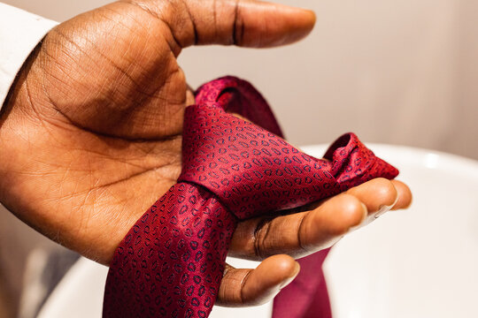 Closeup of tie in hand