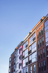 Modern residential building with colorful mural in Noblessner Tallinn on a clear day in 2024