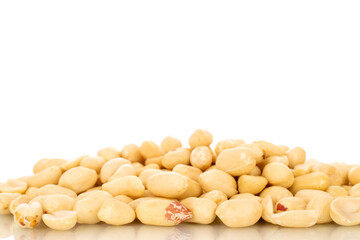 Roasted peanuts, macro, isolated on white background.