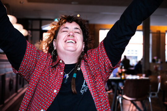 Young woman astonished about the menu 