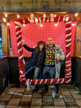 Happy couple street Christmas portrait in frame
