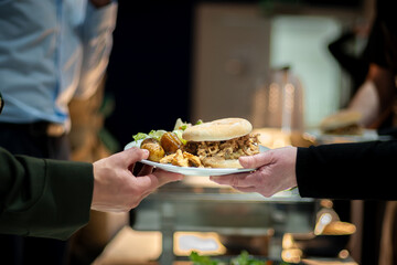 waiter serving food in a restaurant