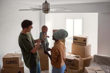 Happy family moving in new home