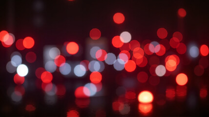 Vibrant red and white bokeh lights in abstract urban night scene