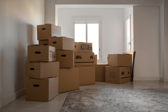 Many boxes with belongings in flat
