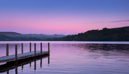 Obraz premium Serenity at Lake Windermere with a Tranquil Pier Embracing the Evening Sky in Gentle Hues