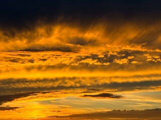 Golden sunset sky glowing heaven clouds