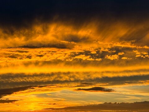 Golden sunset sky glowing heaven clouds - Powered by Adobe