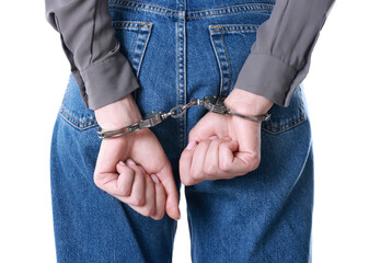 Woman in metal handcuffs on white background, closeup