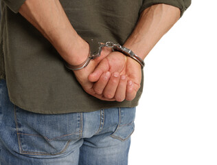 Man in metal handcuffs on white background, back view