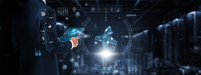 Aerospace: Businessman control and monitoring aerospace technology system on a digital screen. Flight control, satellite systems, navigation, aerospace engineering, unmanned aerial vehicles, avionics.