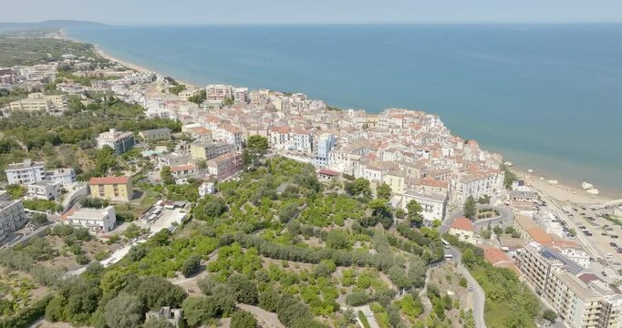 Aerial view of the town and the historic center of Rodi Garganico, located in Puglia, Italy, on the coast of the Adriatic Sea. It is a tourist destination in Gargano, in the province of Foggia.