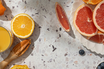 Citrus fruits and orange juice on a table
