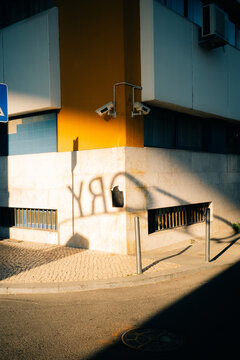 Building Corner with Security Cameras and Shadows 