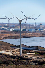 Onshore wind turbines, sustainable renewable electricity concept