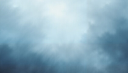 Abstract blue misty background with soft light rays and cloud-like textures