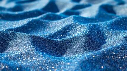 A close up shot of a blue glittery fabric
