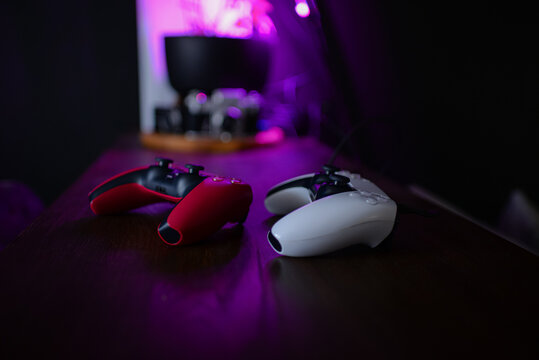 Retro neon game controller. Gamepad for games. Sci-fi Cyber futuristic purple-pink colors joystick. Game