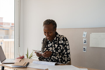 Happy student of flight school doing homework