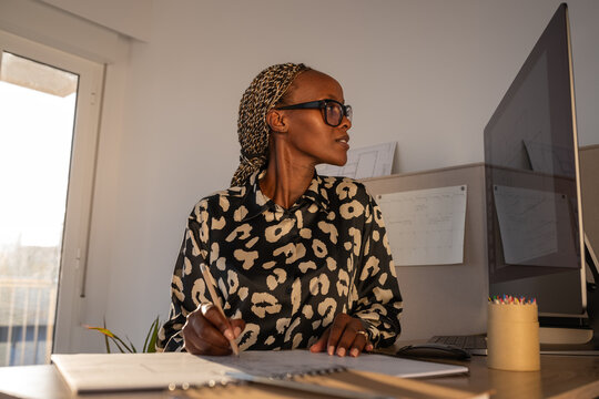  Beautiful woman working at office