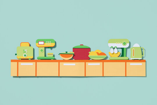 Colorful Kitchen Appliances On Countertop In Paper Craft Style