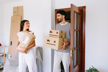 Entering New Home with Boxes