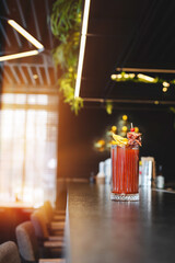 Cocktail party, alcoholic cocktail on the background of a restaurant, menu, bar, pub.