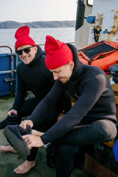 Divers Preparing for an Exploration in the Barents Sea Under 